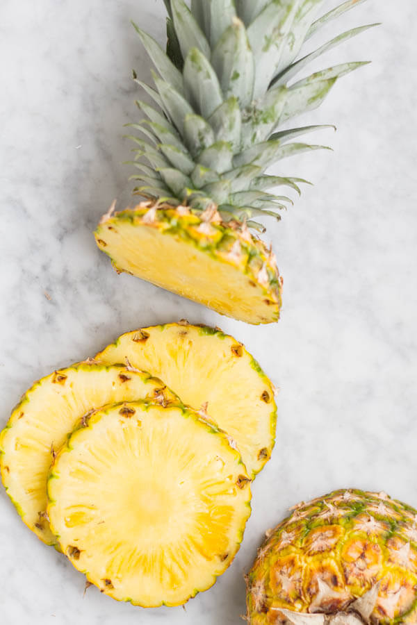 a whole pineapple in slices