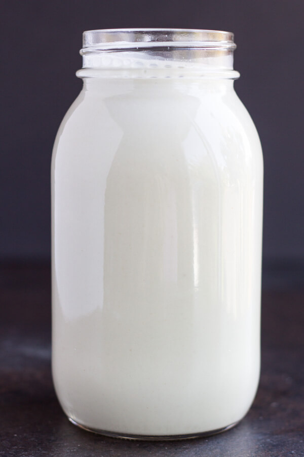 glass jar of white liquid