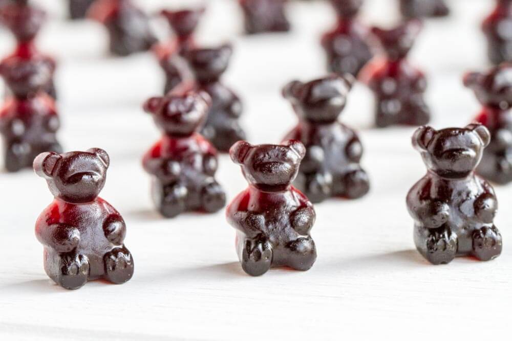 Immune Boosting Elderberry Gummy Bears on white table