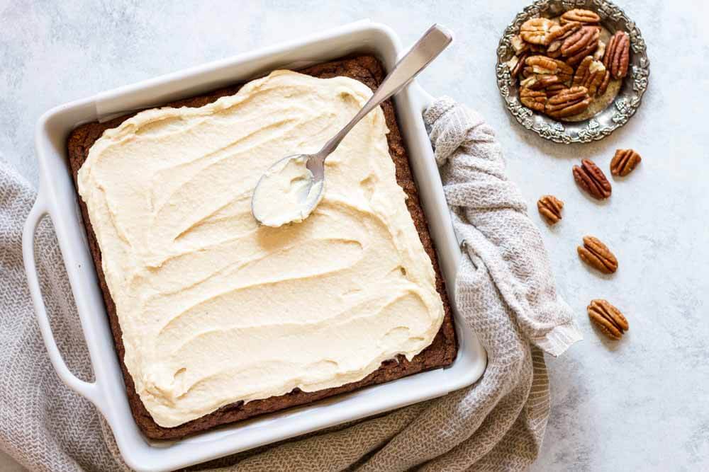 pumpkin cake with white frosting