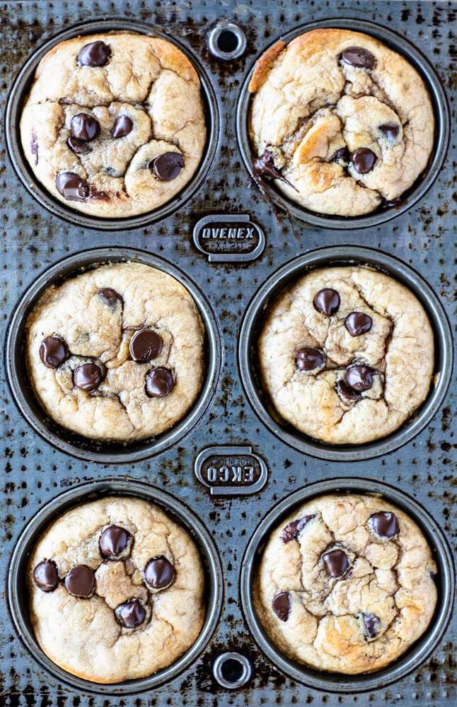 6 muffins with chocolate chips in a muffin pan