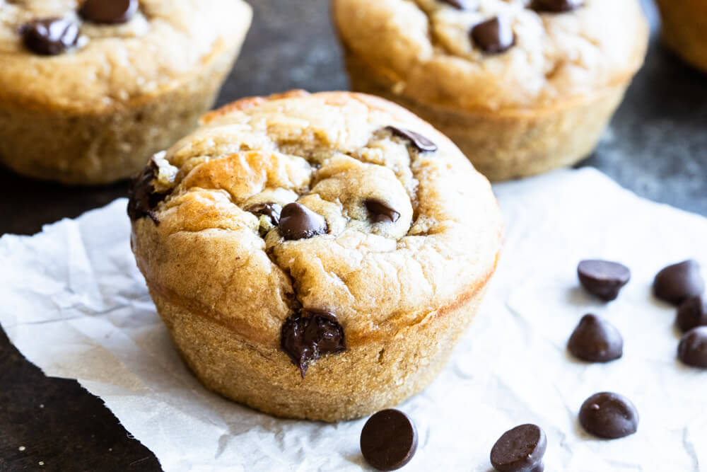 close up of a muffin with chocolate chips on top