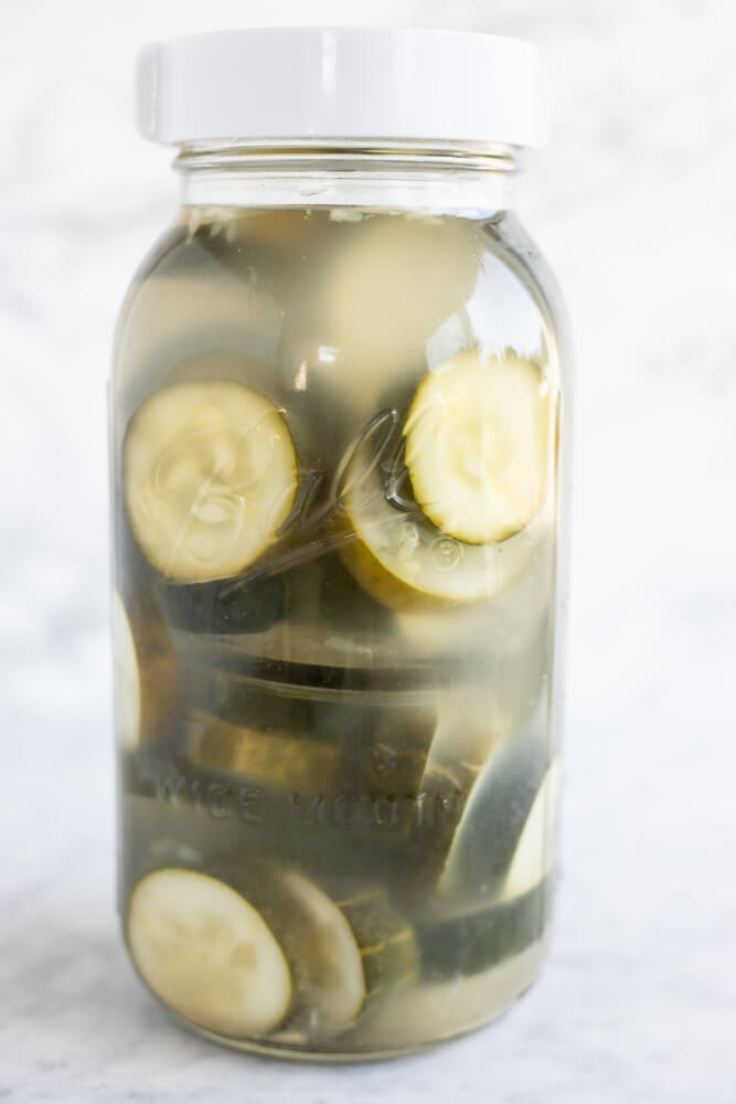 close up of a jar of homemade pickles