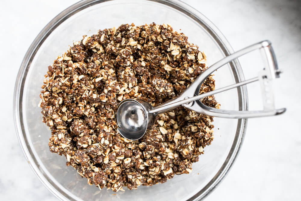 glass bowl with gingerbread energy ball mixture