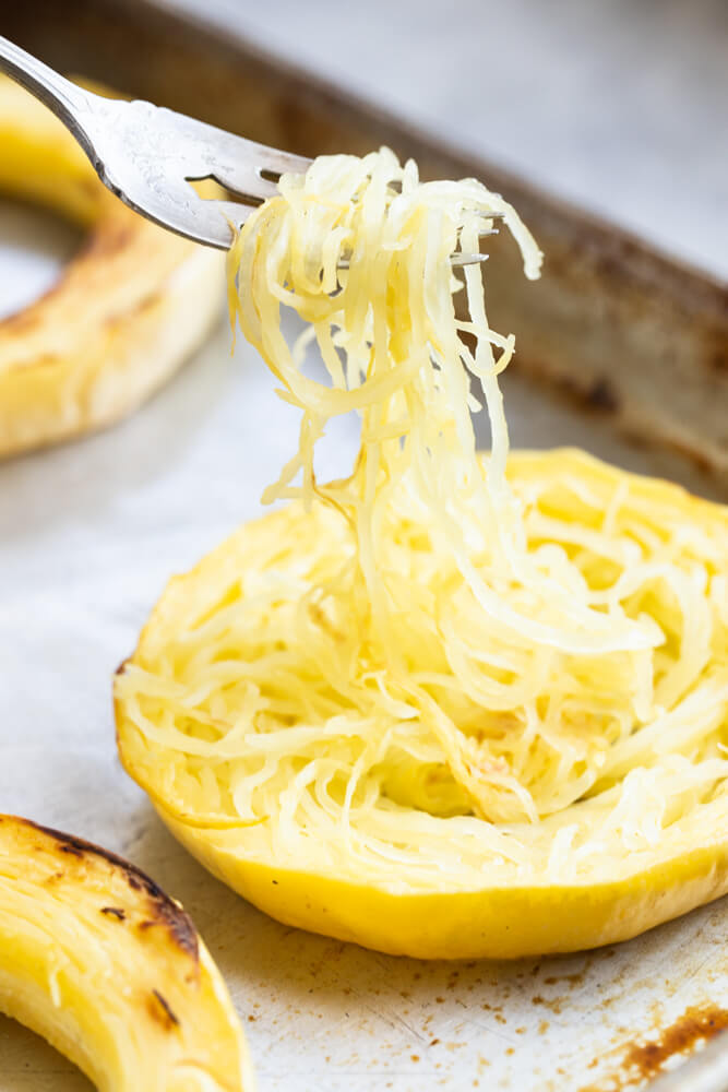 fork lifting out of spaghetti squash