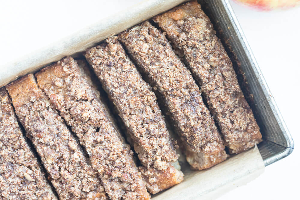 sliced apple bread in metal loaf pan