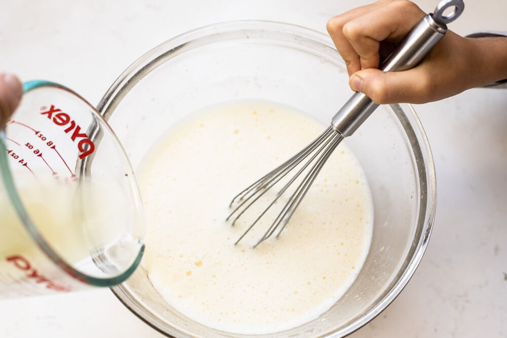 whisking eggs in bowl