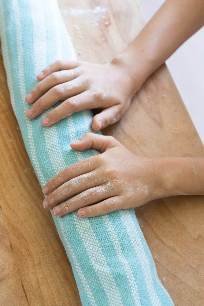 bread dough wrapped in towel