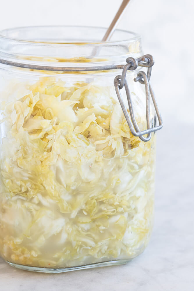glass jar of sauerkraut