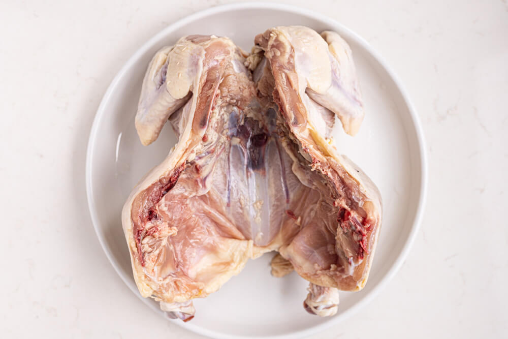 inside of a cut whole chicken