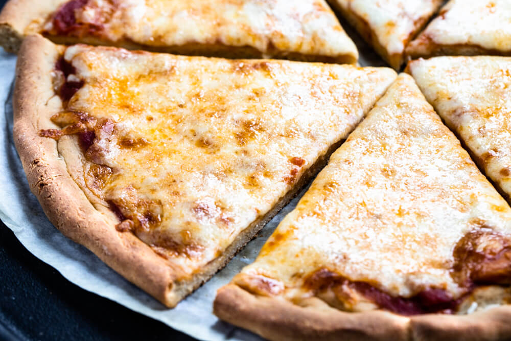 pizza slice on parchment paper