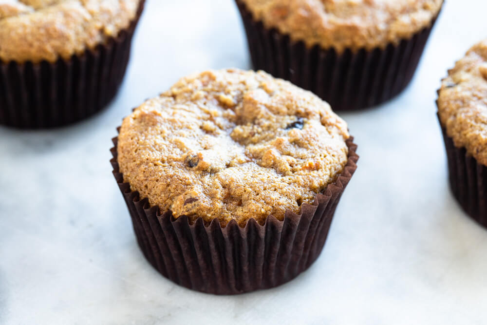 carrot cake muffin with brown paper liner