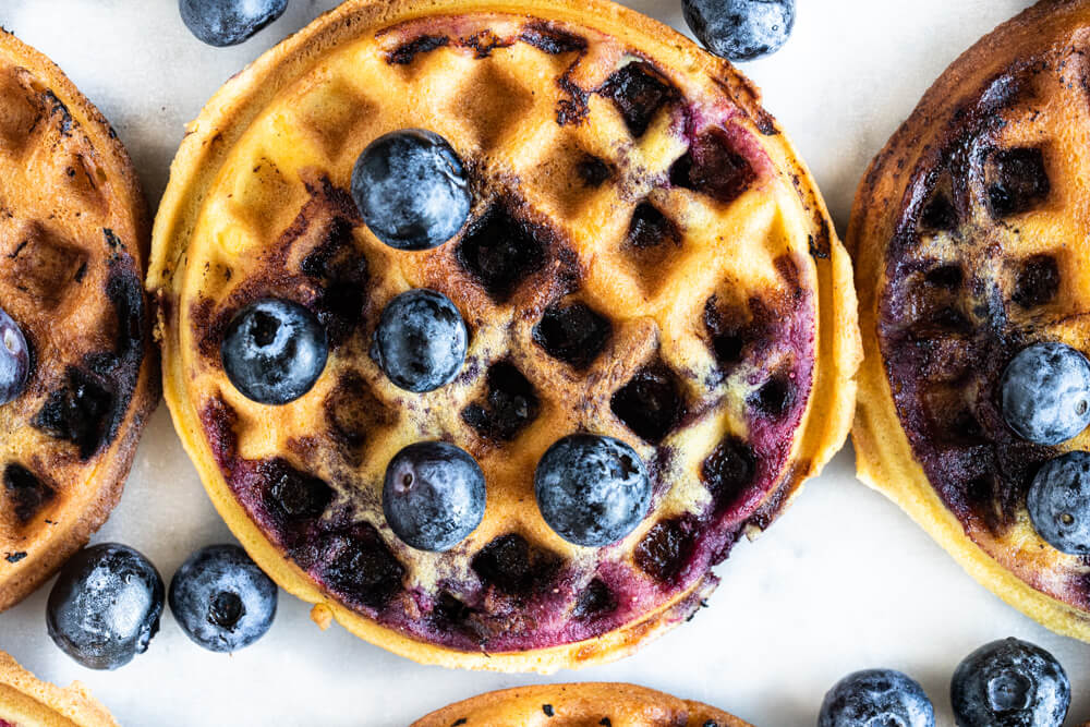 close up of mini waffle with blueberries