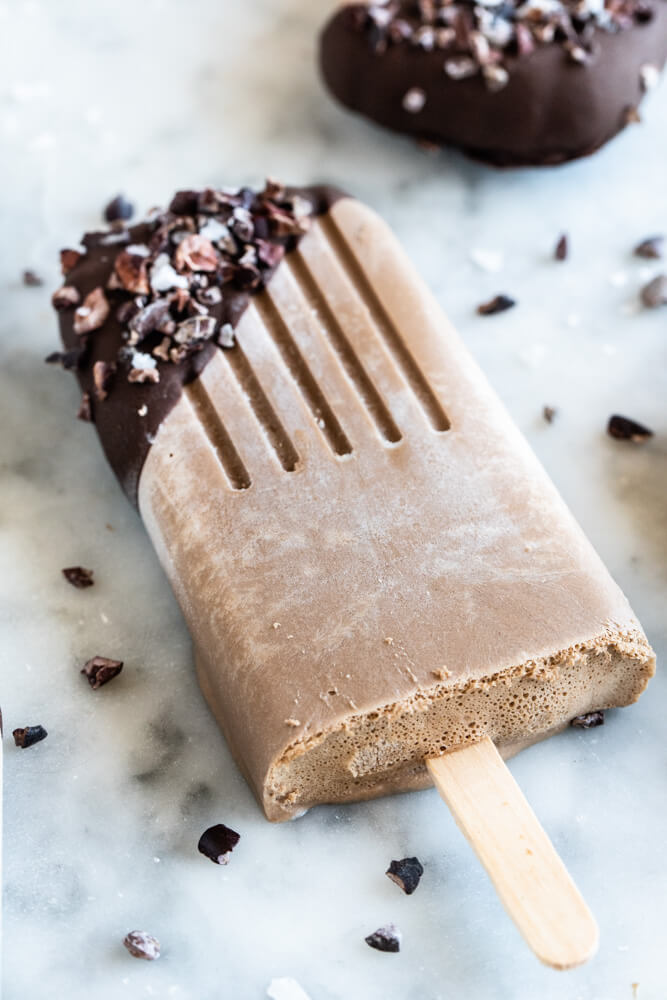 close up of chocolate popsicle with hard shell