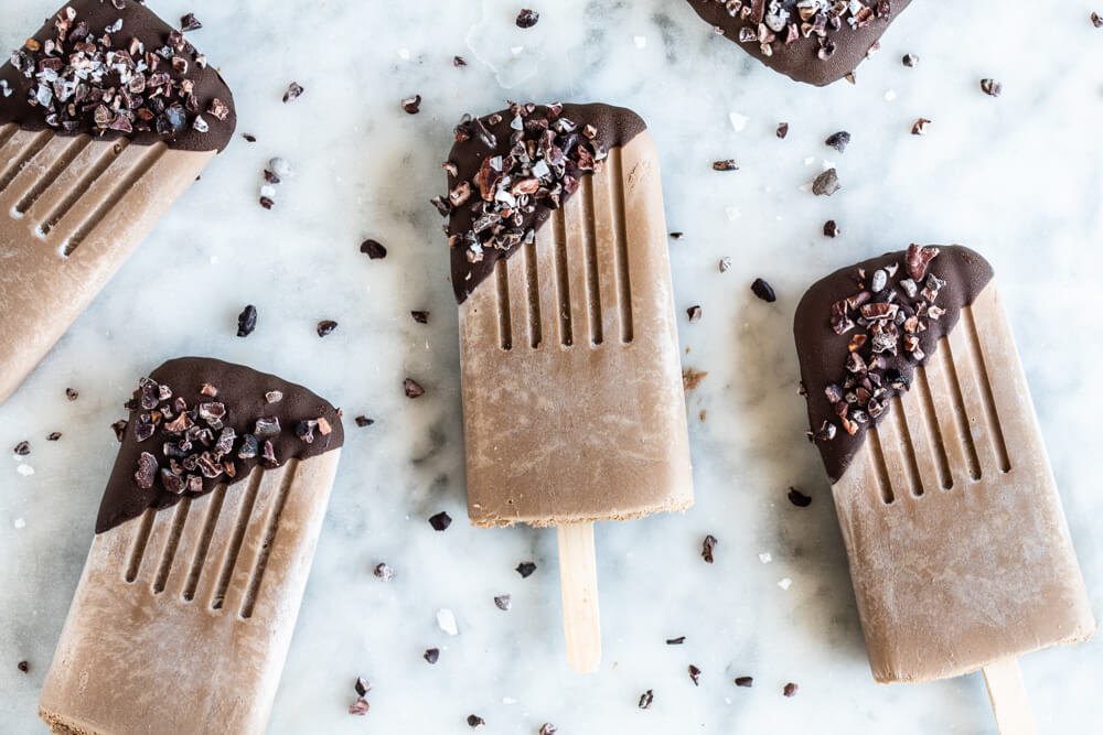 chocolate popsicles on white counter