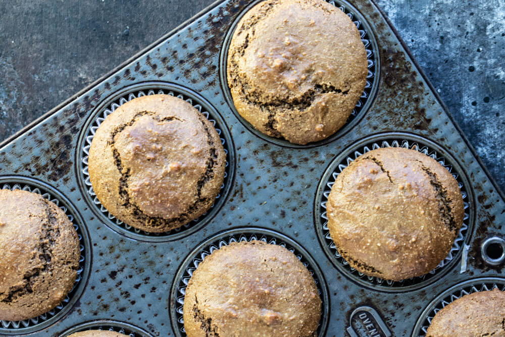 brown muffins in muffin tin