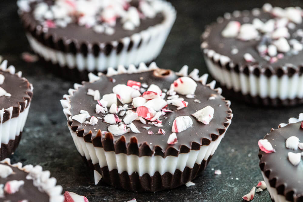 candy cane cups on black metal pan