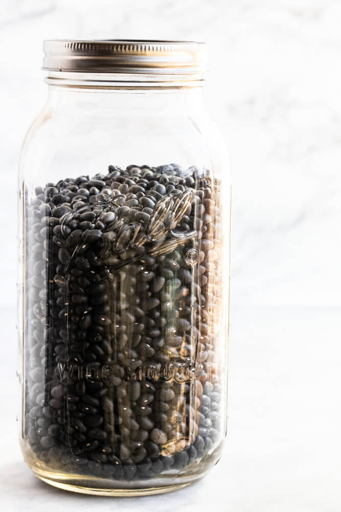 glass jar full of black beans