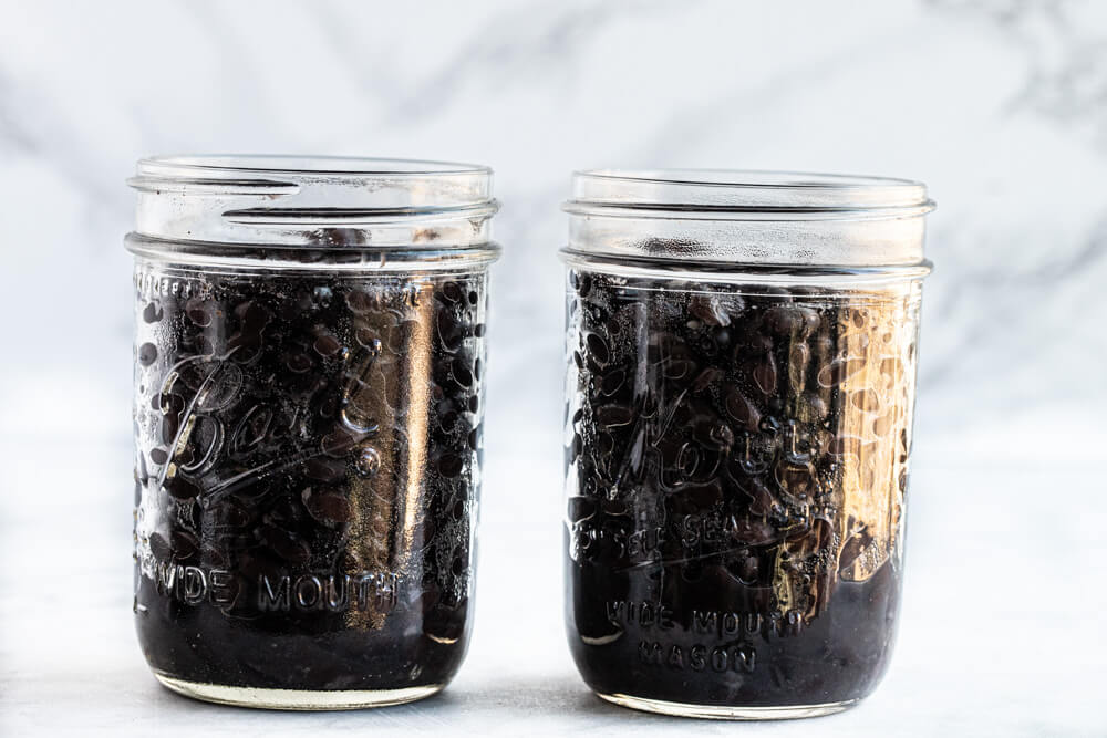 two glass jars of beans