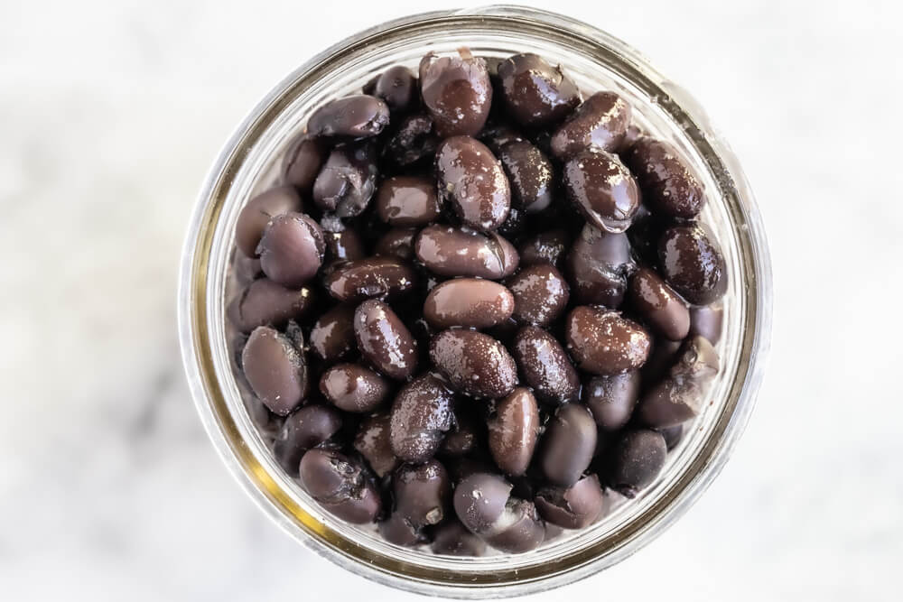 close up of a jar of black beans