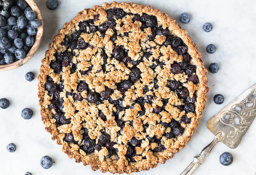 whole blueberry pie with crumble on top
