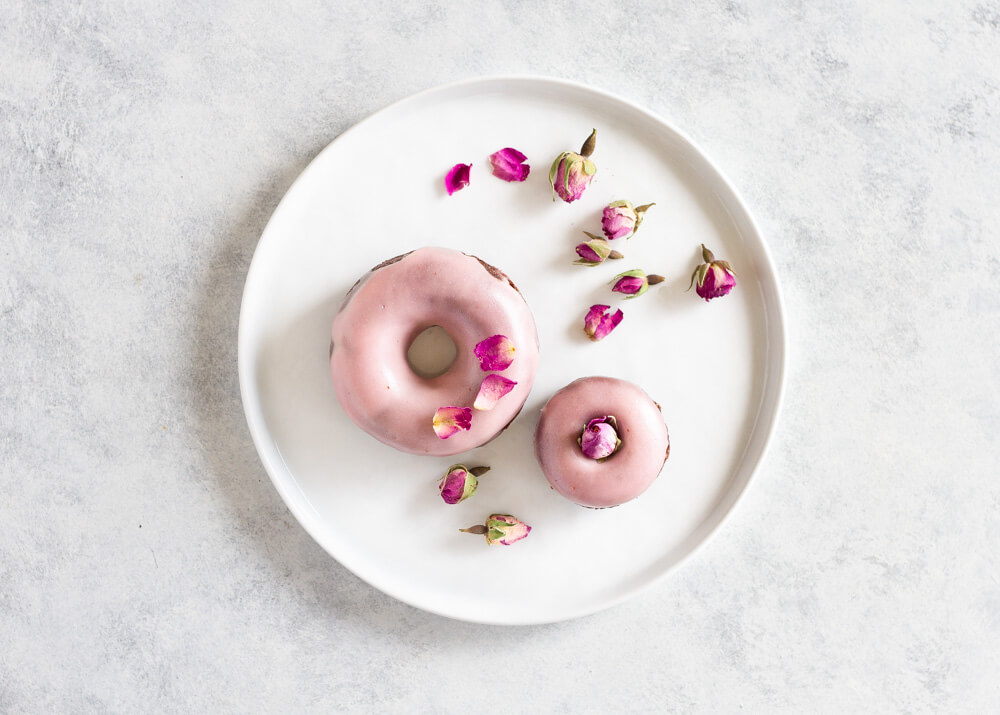 Chocolate Rose Donuts on a white plate