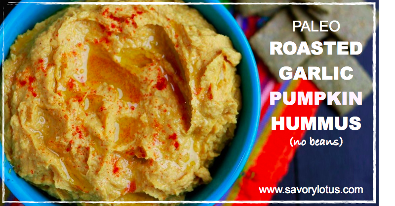 hummus in a blue bowl with paprika on top