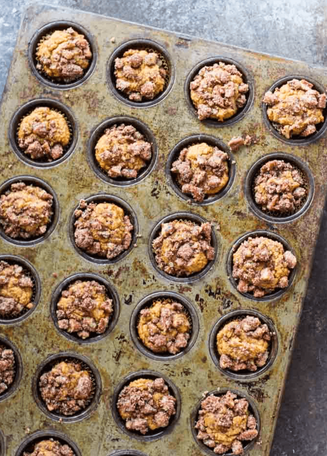 mini pumpkin muffins an a large baking pan